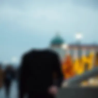 Cultural significance of the black round neck sweater in fashion