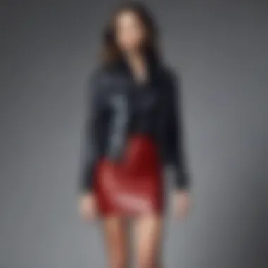 Stylish layering of leather skirt with blouse and outerwear.