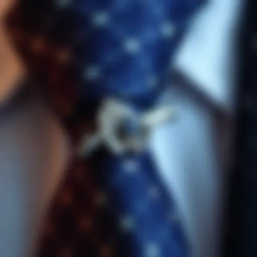 A close-up of an elegant tie clip showcasing intricate design details.