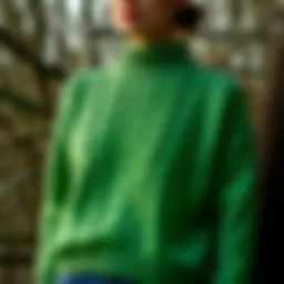 A vibrant green knitted sweater displayed in a natural setting