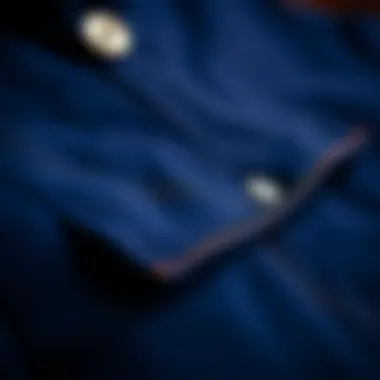 Close-up of an indigo jacket's fabric and stitching, highlighting craftsmanship.