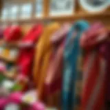 Elegant display of colorful Jan Jan shawls arranged artistically.