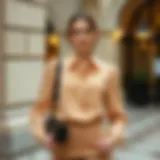 Elegant beige blouse styled for a formal occasion