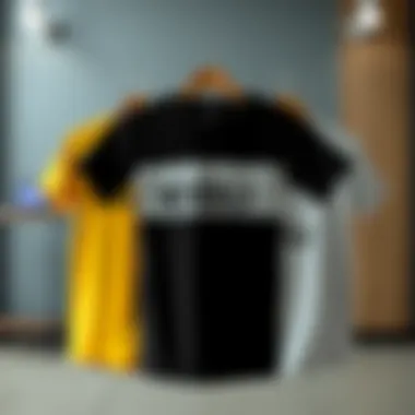 Group of different Kigili t-shirt styles arranged aesthetically to highlight versatility.