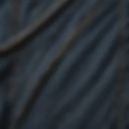A close-up of denim fabric with intricate stitching