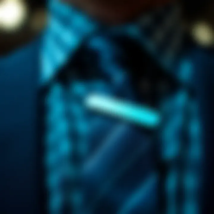 An illustration showing the proper way to attach a tie clip to a tie.