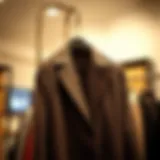Elegant double-breasted coat hanging on a stylish rack