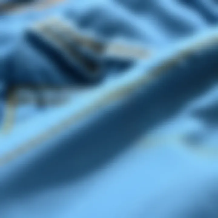 Detailed view of fabric texture and stitching of Mavi high-waisted jeans