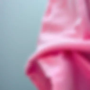 Close-up of pink denim fabric showcasing its texture and color