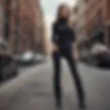 Stylish black flare jeans paired with a trendy top in an urban setting