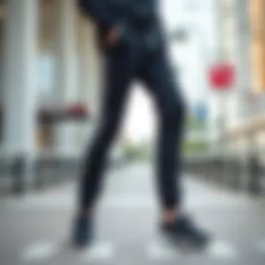 Stylish black jogger pants displayed in a modern urban setting