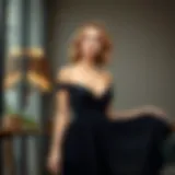 Elegant black pleated dress showcasing its flowing fabric and stylish silhouette.