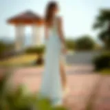 Elegant long dress with a high slit showcased in an outdoor setting